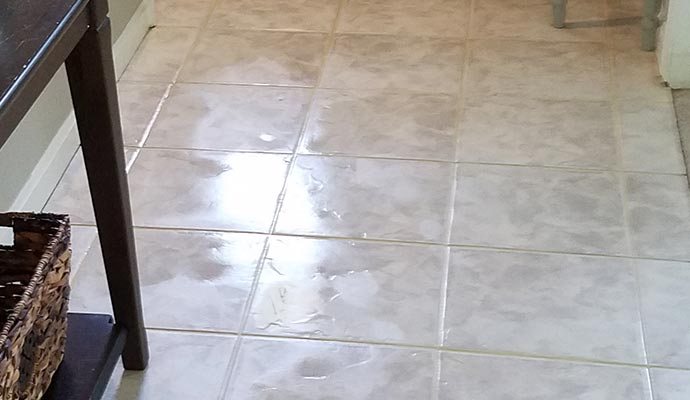 Water damaged floor tile
